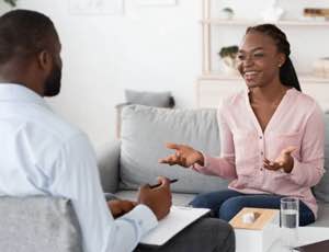 woman speaking to doctor